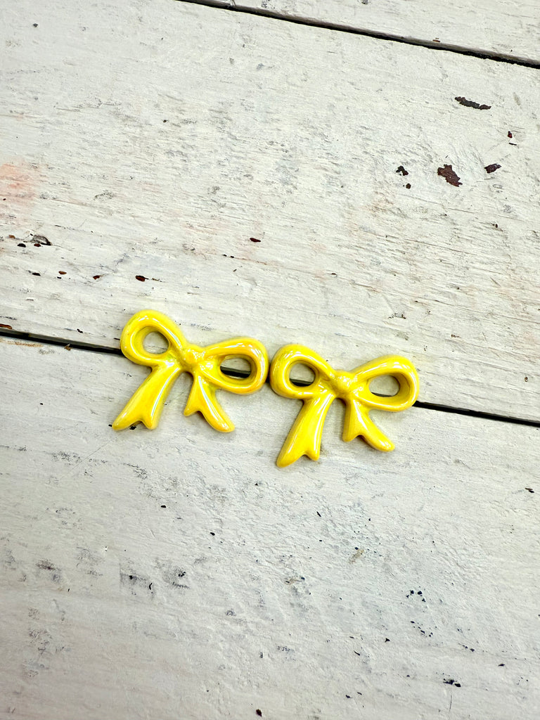 Chrome Bow Stud Earrings