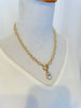 Gold Linked Necklace with Oval Rhinestone Pendant
